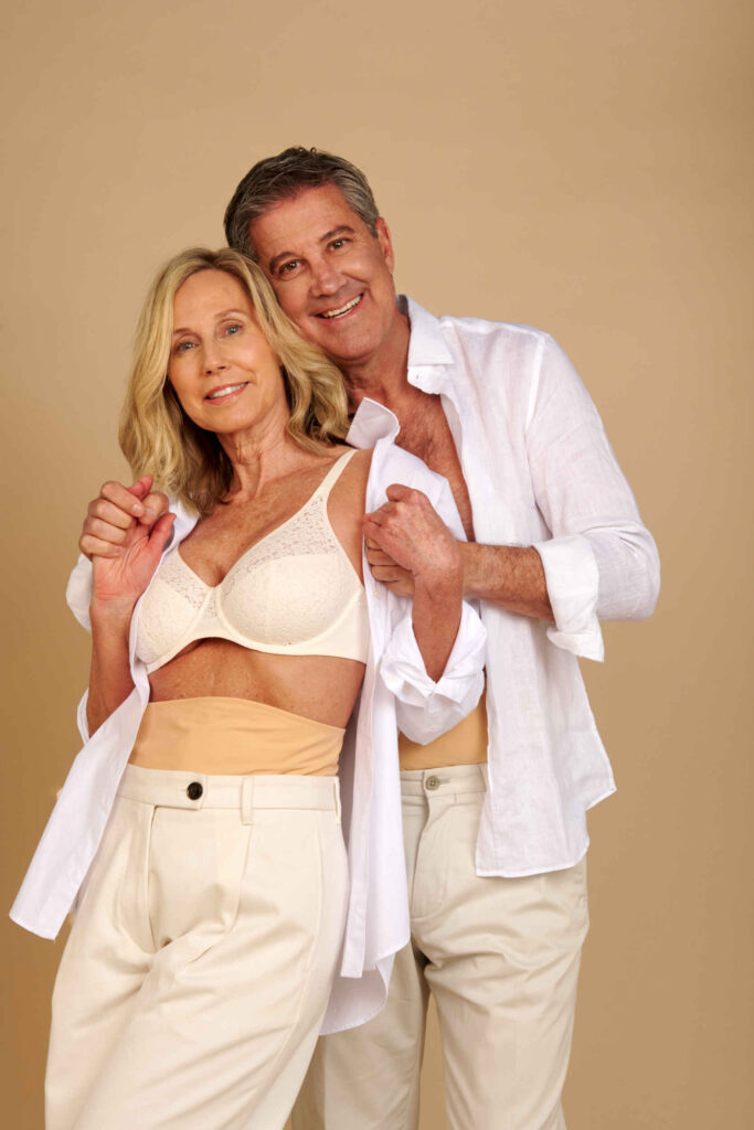 beige ostomy bag cover belts for couples couple in white shirts wearing beige ostomy bag cover belts