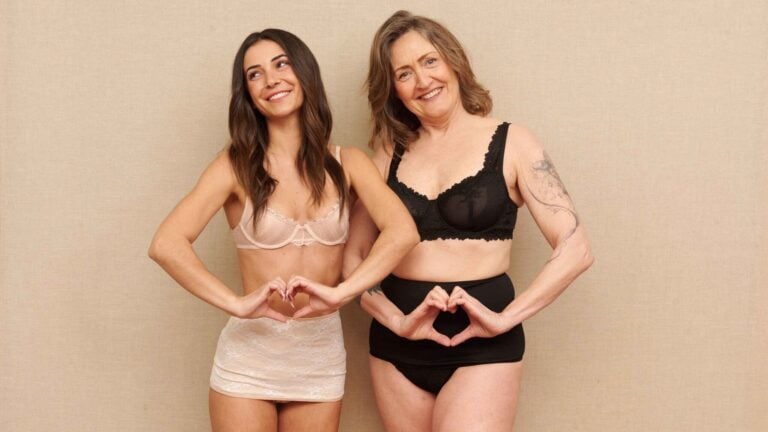 Women wearing soft SIIL stoma wraps that hold the bag close